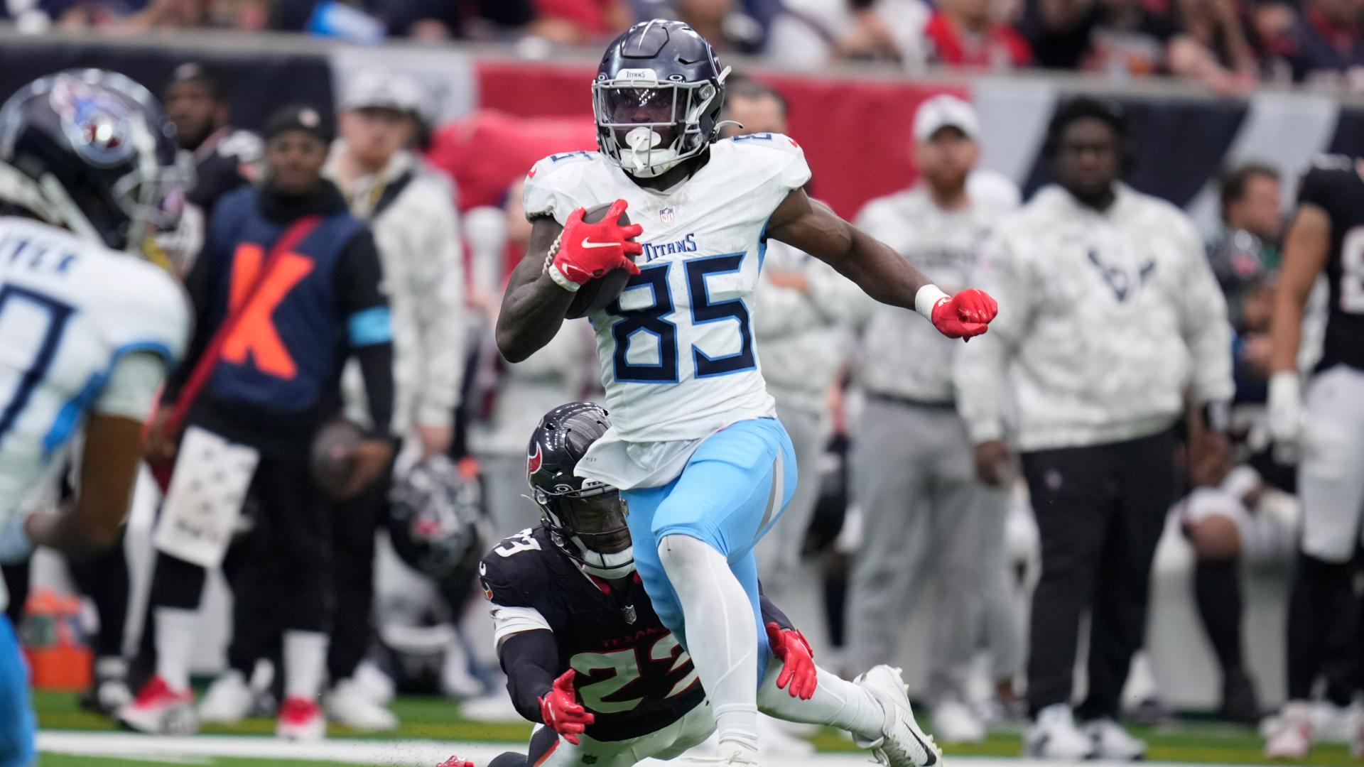 Chig Okonkwo races past the Texans' defense for a 70-yard TD