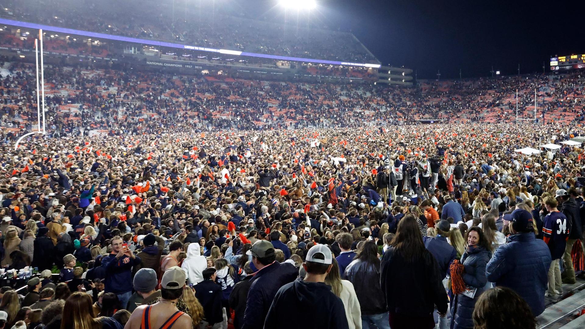 Auburn fans storm field after stunning Aggies in 4OT thriller