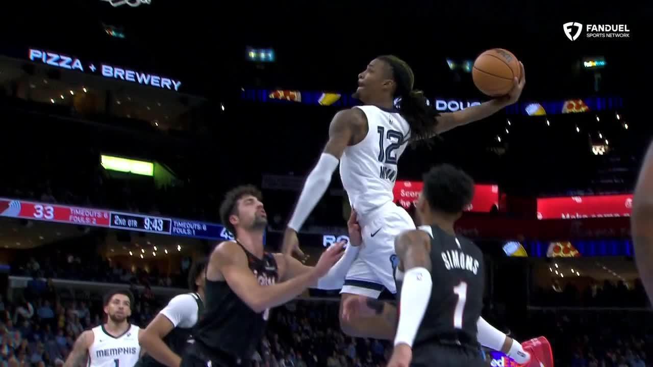 Ja Morant reaches way back for ferocious flush