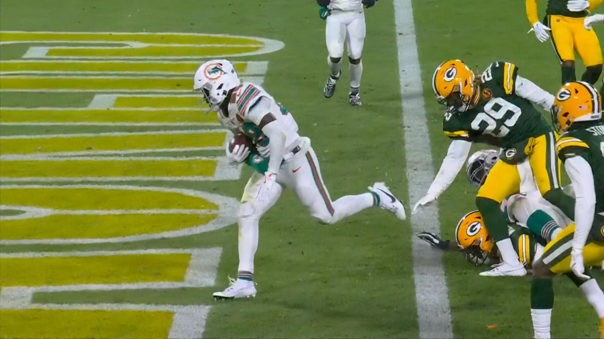 De'Von Achane gobbles up a tackle en route to Dolphins TD