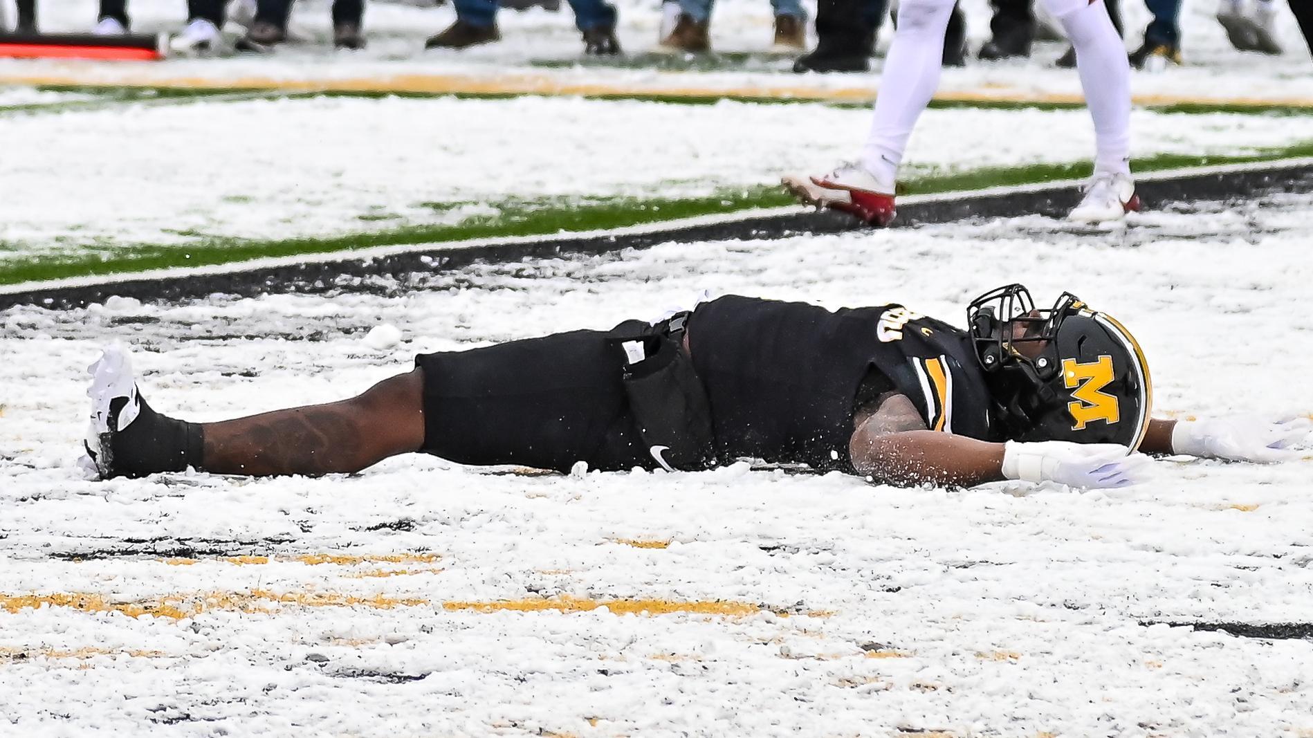 Marcus Carroll celebrates Mizzou TD with snow angels