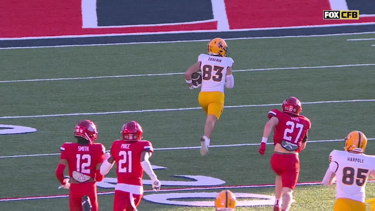 Derek Eusebio dodges tackles en route to an Arizona State TD