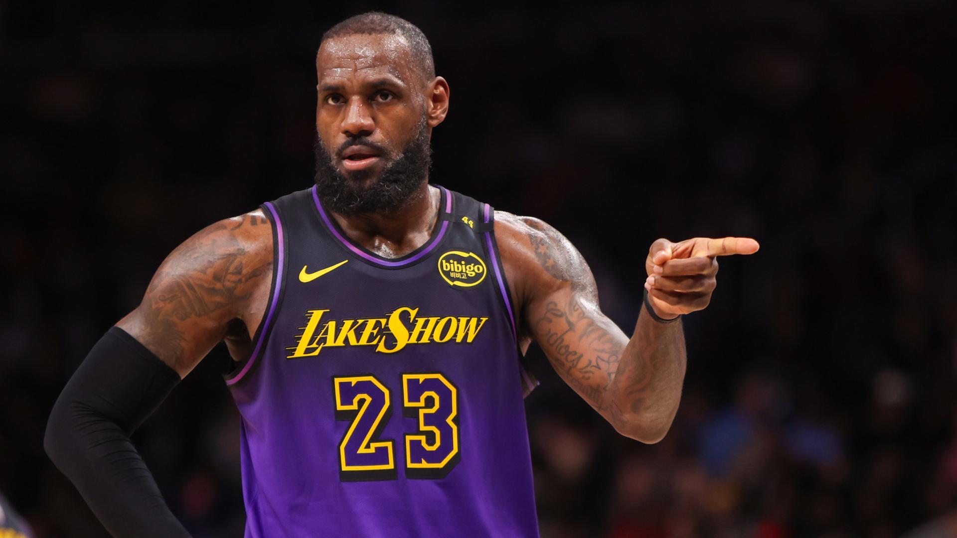 LeBron creates 41K-point club, notches triple-double in Lakers' OT loss