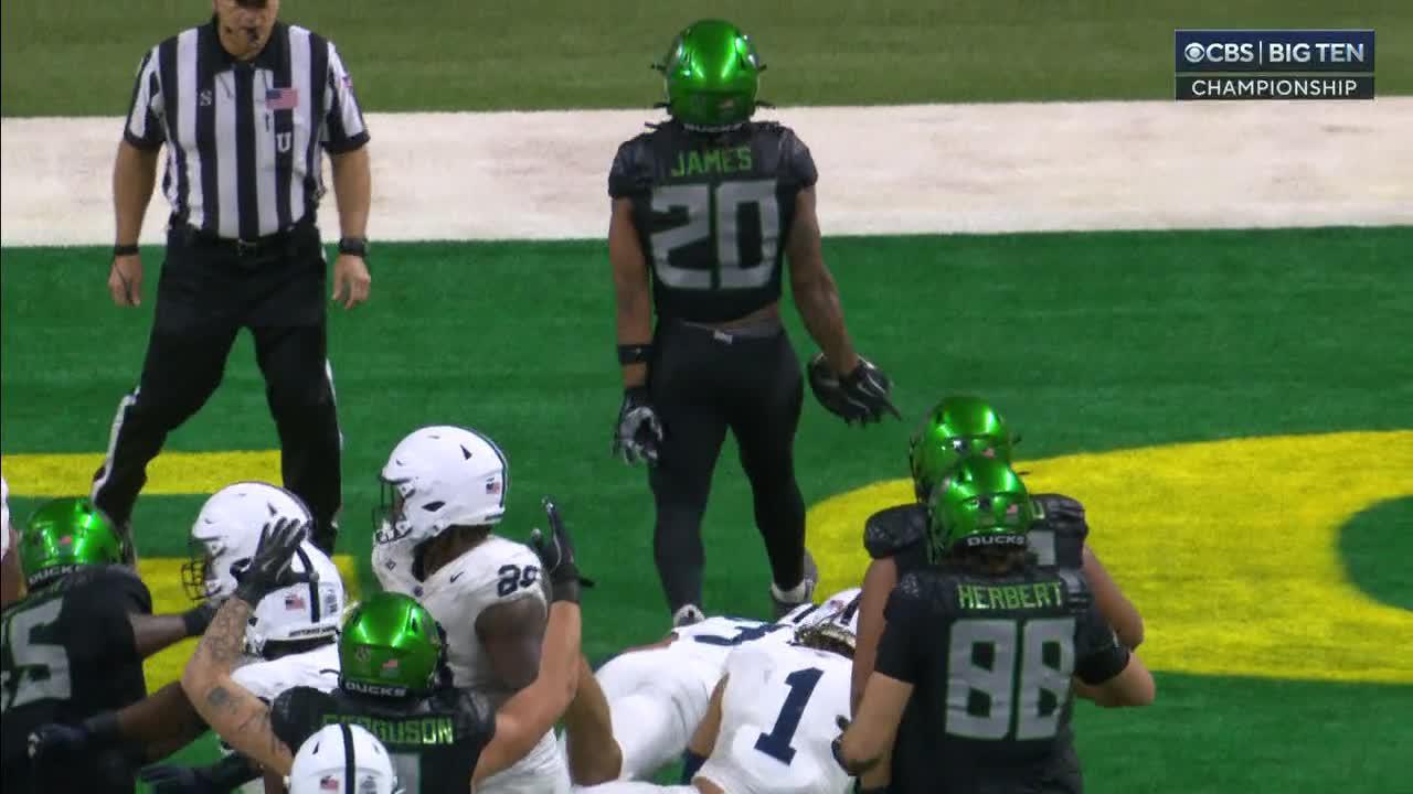 Jordan James punches his 2nd TD for Oregon