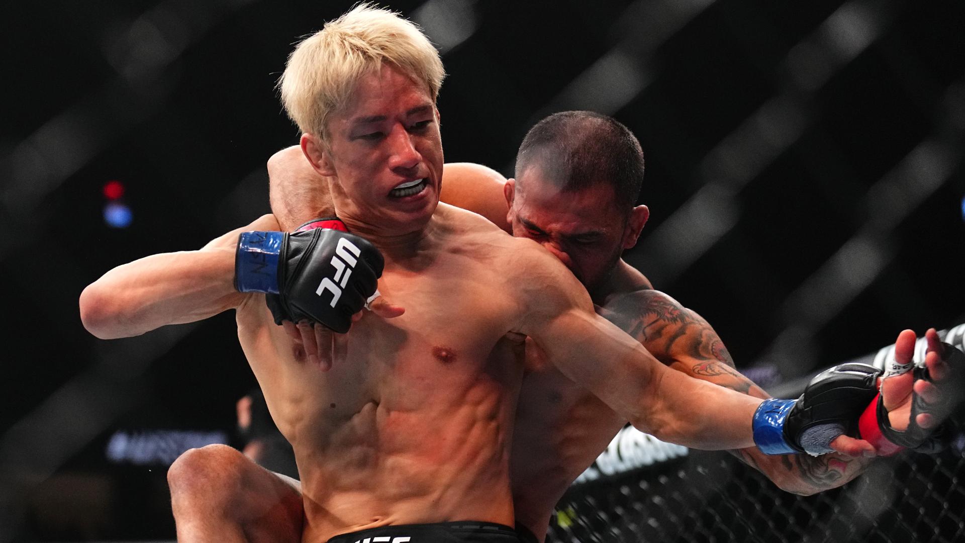 Alexandre Pantoja celebrates after Round 2 victory over Kai Asakura