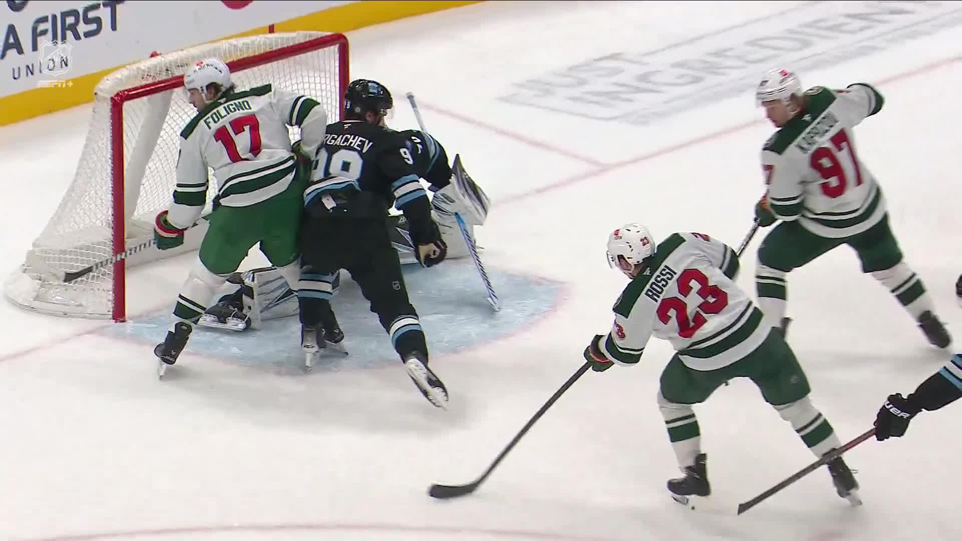 Marco Rossi sneaks puck by for game-tying goal