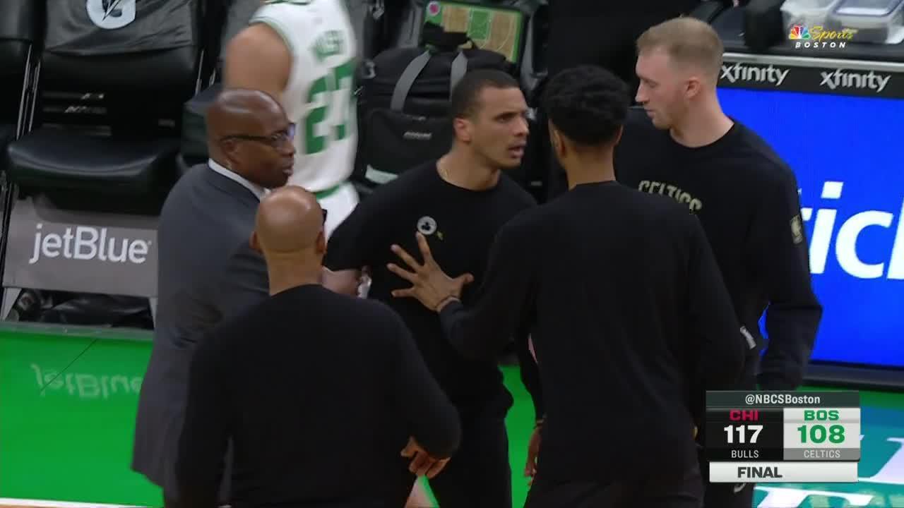 Joe Mazzulla restrained by assistant coaches after yelling at ref