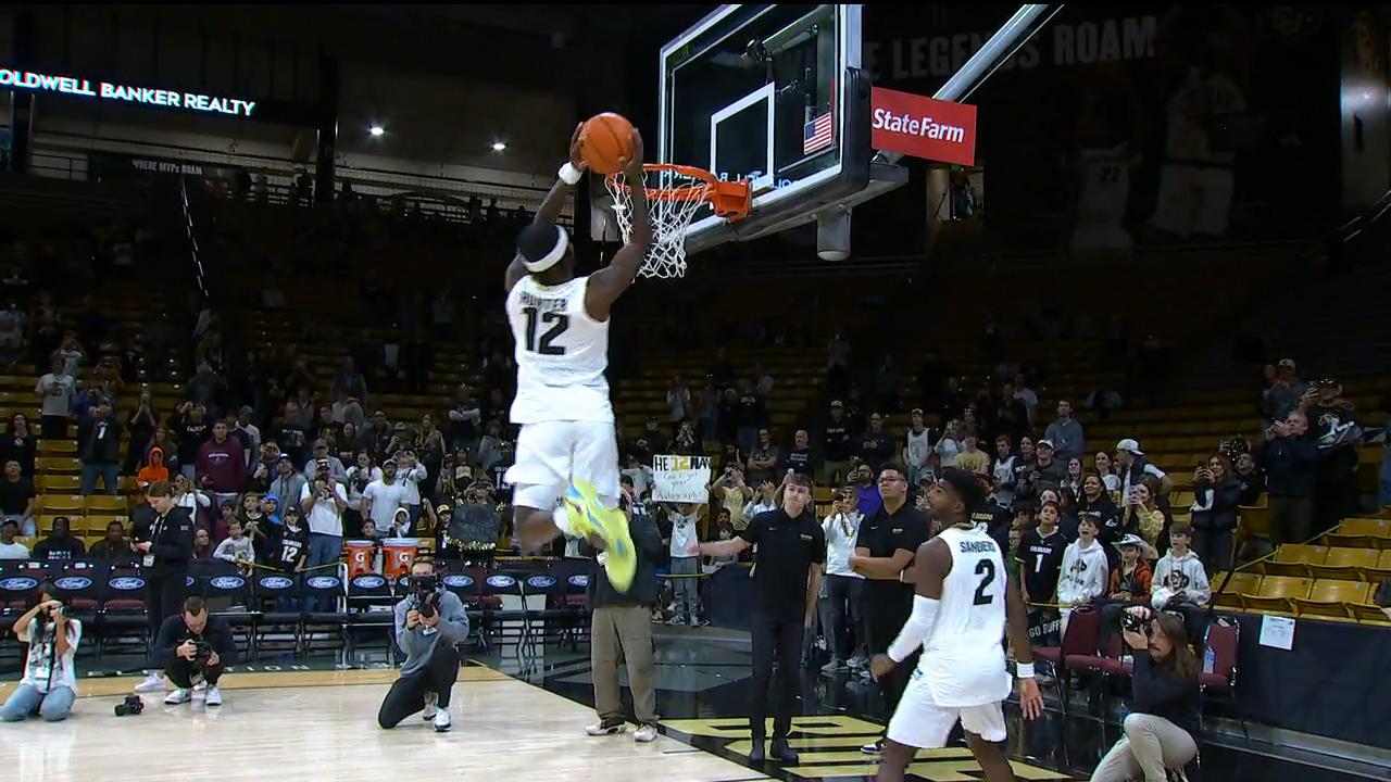 Travis Hunter dazzles with a dunk show before Colorado's basketball game