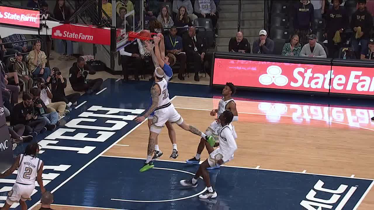 Cooper Flagg skies for a two-handed jam