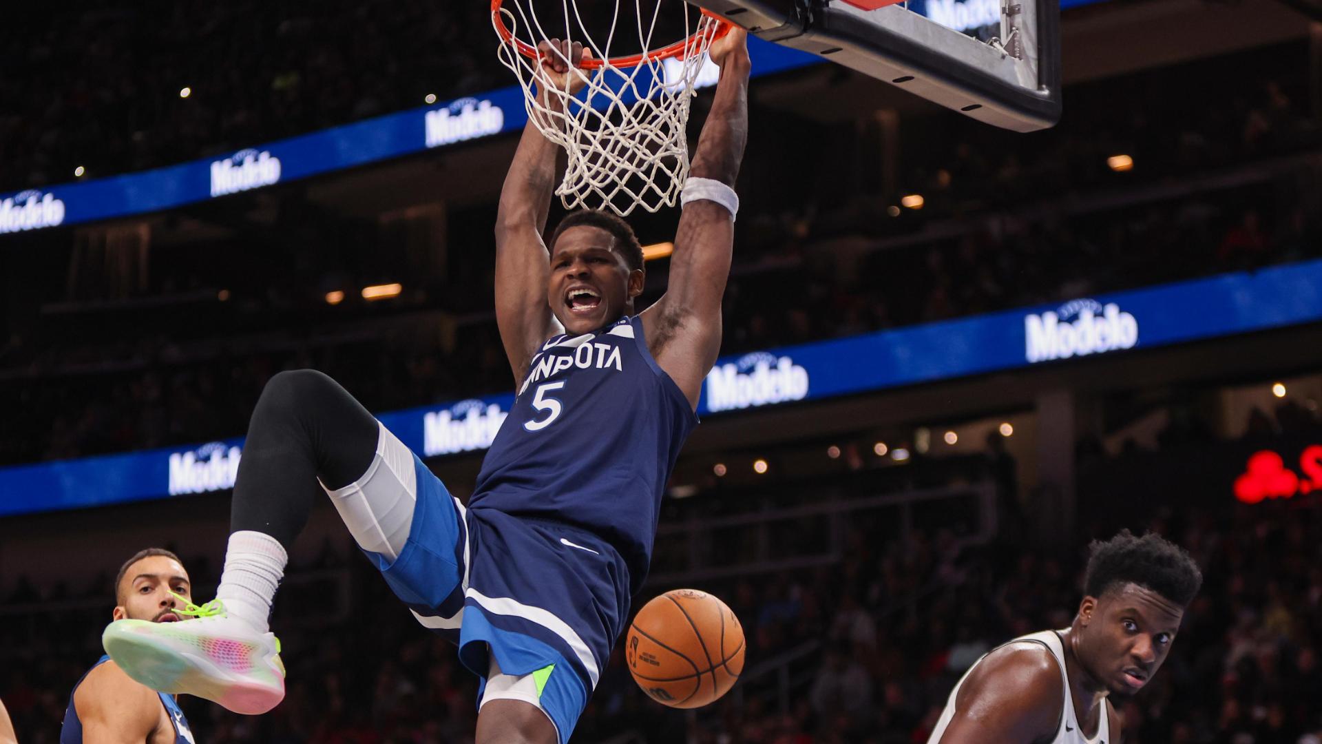 Anthony Edwards levitates on rim after ferocious dunk