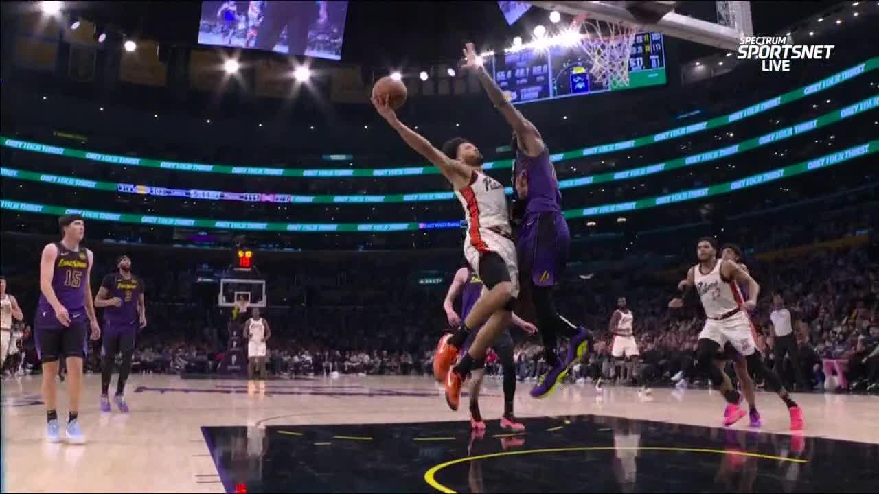 Cade Cunningham drops in layup over LeBron James