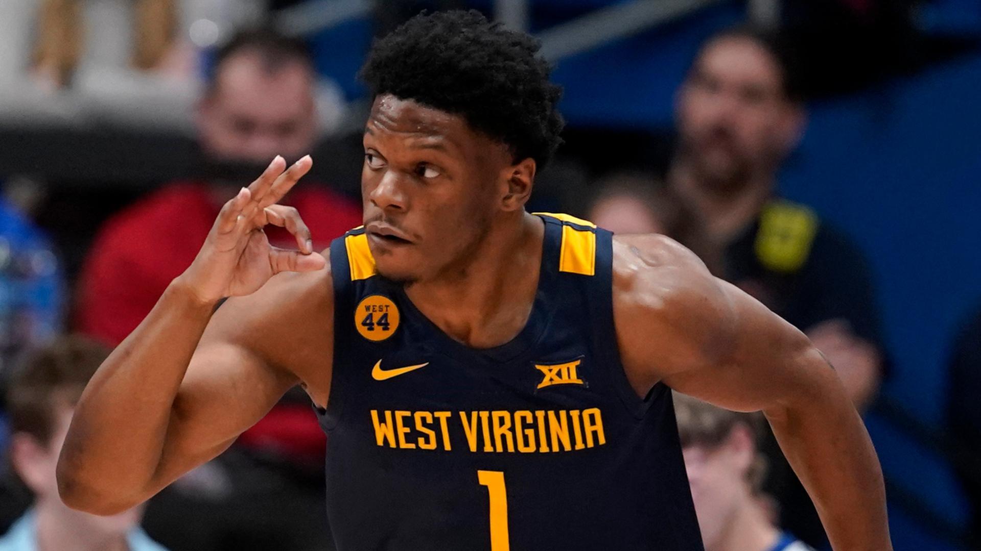 West Virginia upsets Kansas in Lawrence after chaotic finish