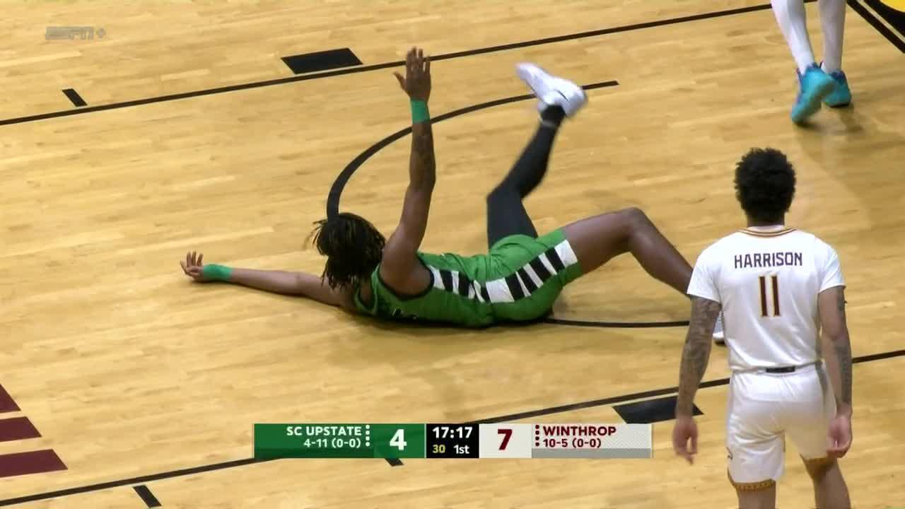 Mister Dean falls to the floor after poster slam for SC Upstate