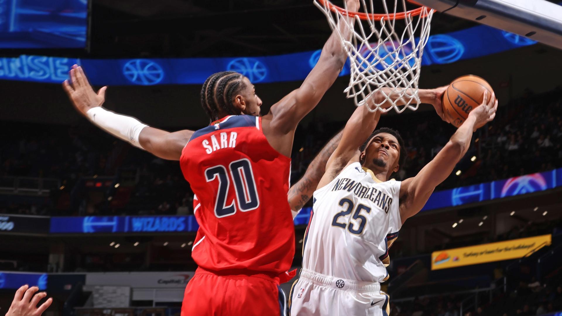 Trey Murphy III glides in for a massive dunk