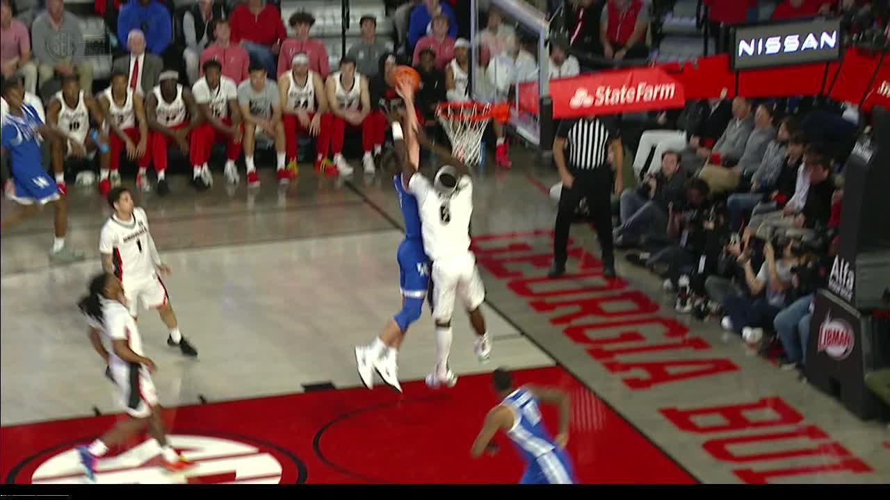 Andrew Carr goes hard to the rim for a Kentucky dunk