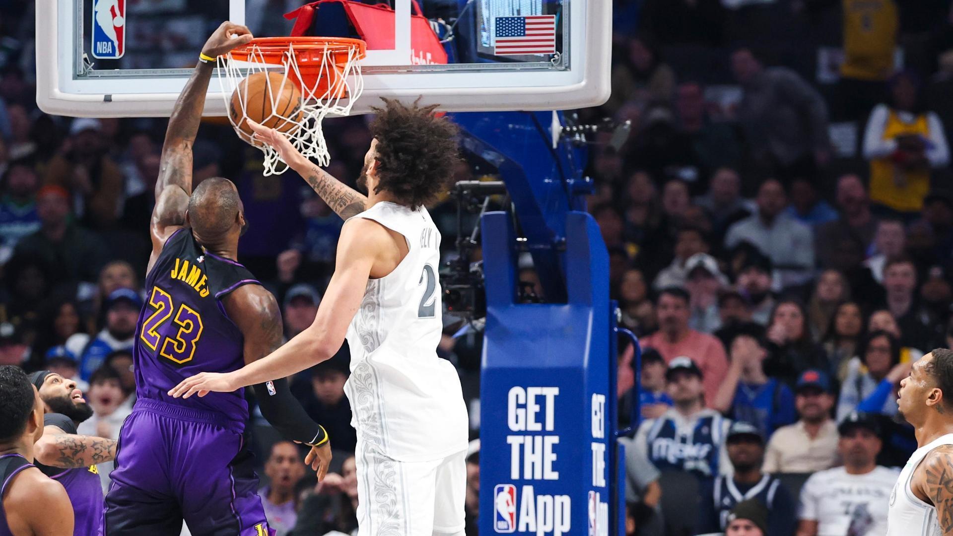 LeBron amazes with left-handed poster jam