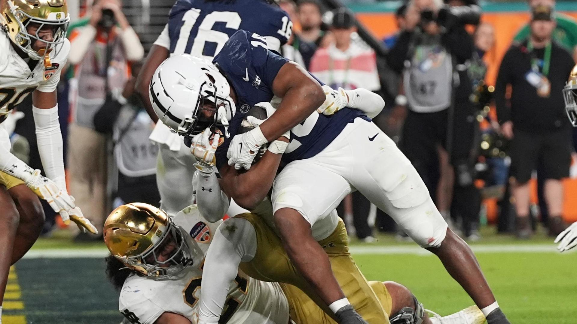 Penn State's Nick Singleton barrels in for TD