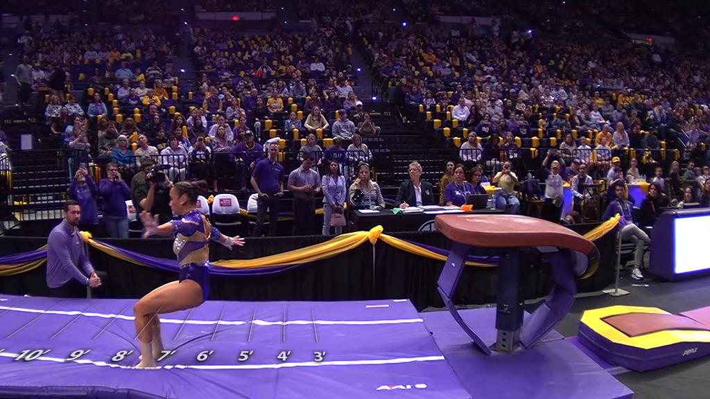 Aleah Finnegan scores a 9.950 on vault for LSU