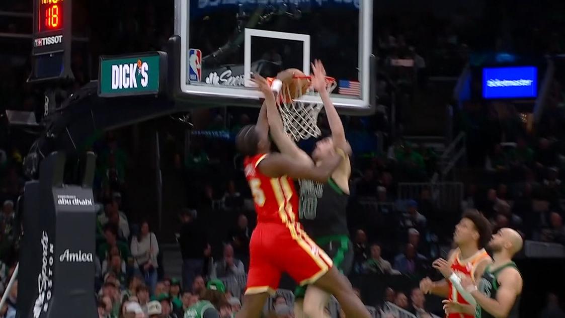 Clint Capela puts Luke Kornet on a poster