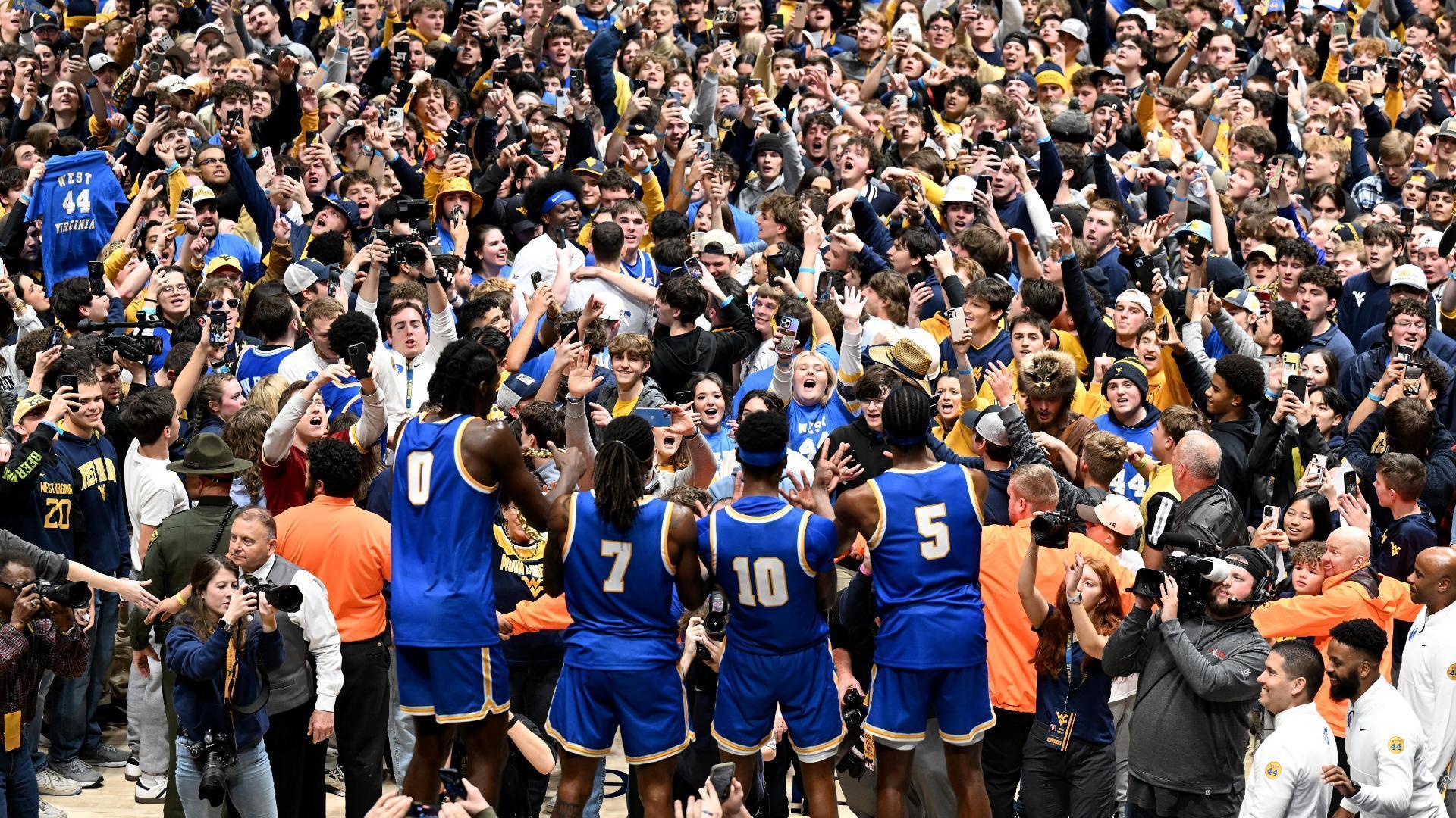 Fans rush the court as West Virginia upsets No. 2 Iowa State