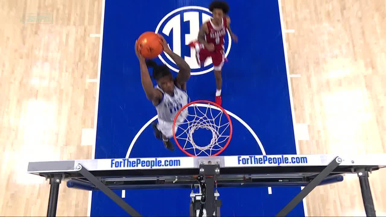 Otega Oweh gets up for fast break Kentucky slam