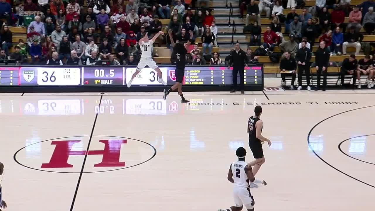 Penn's Sam Brown banks in half-court shot to beat halftime buzzer