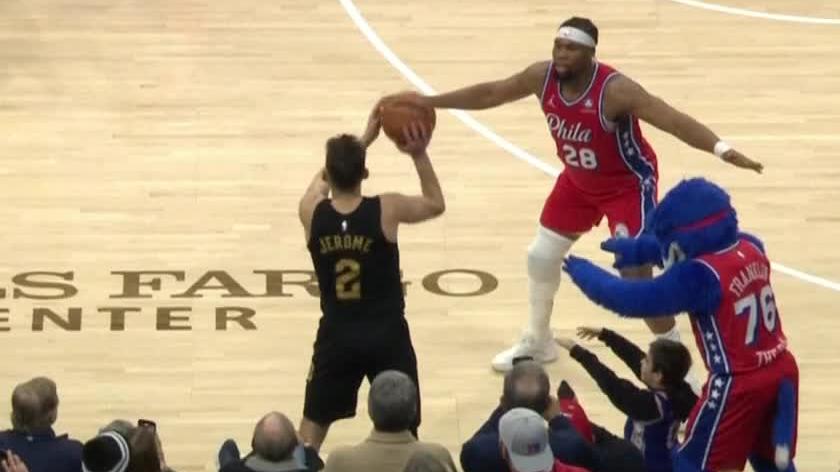 76ers mascot Franklin wills a turnover from Ty Jerome