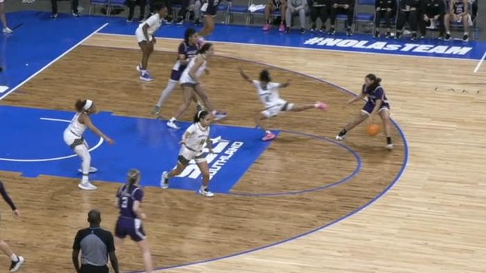 Defender goes flying trying to defend this step-back 3