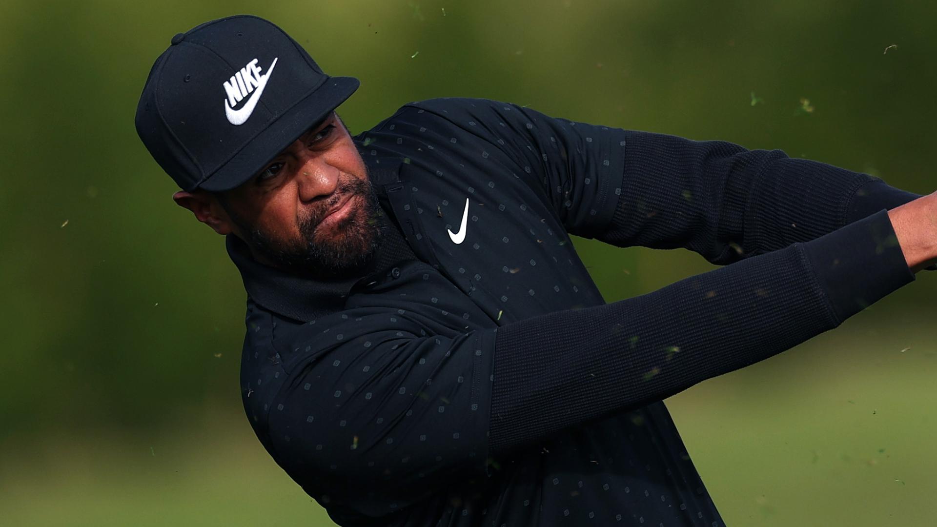 Finau's flop shot rolls into the cup for birdie