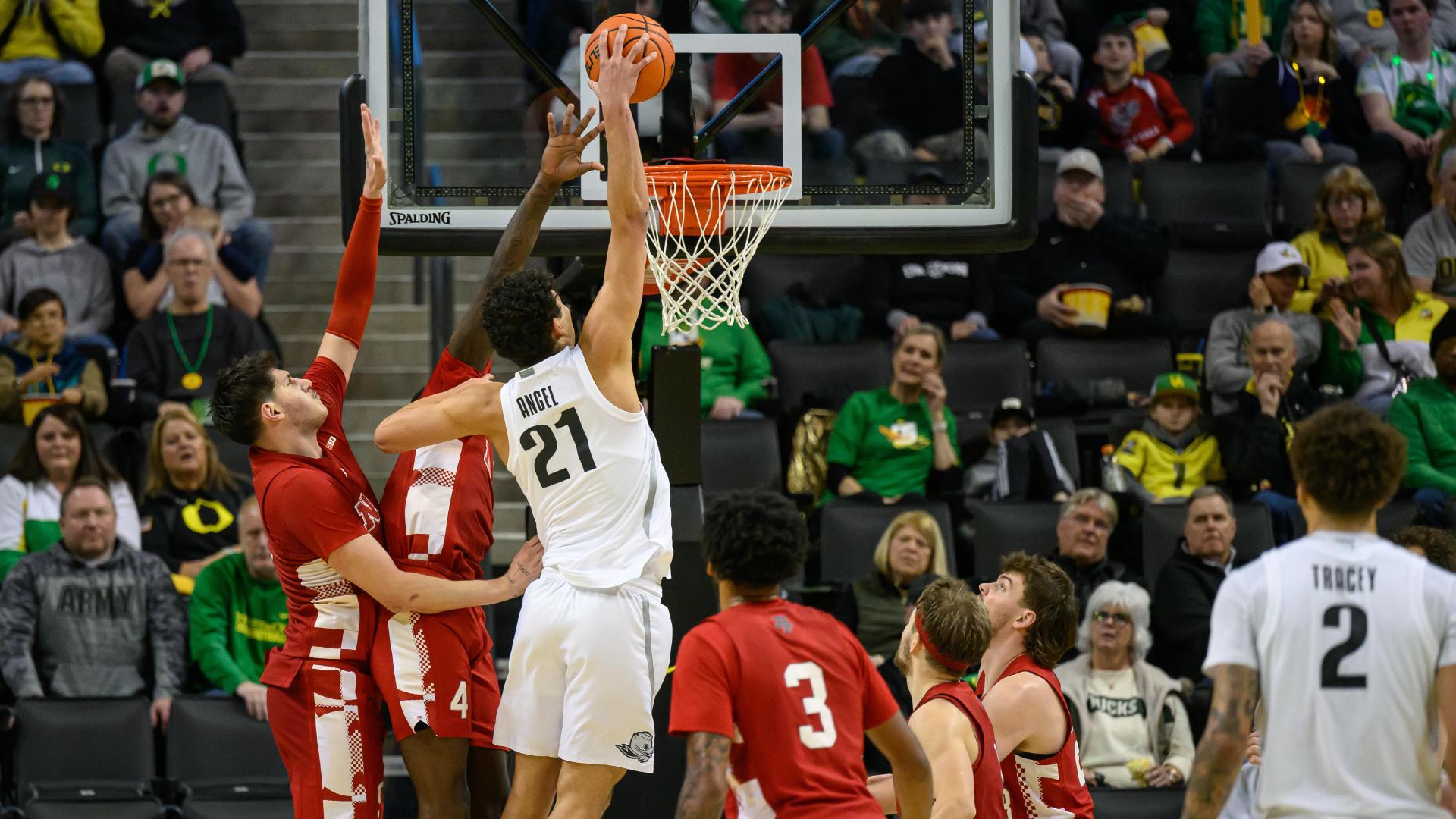 Brandon Angel drives to the hoop and finishes with a huge poster