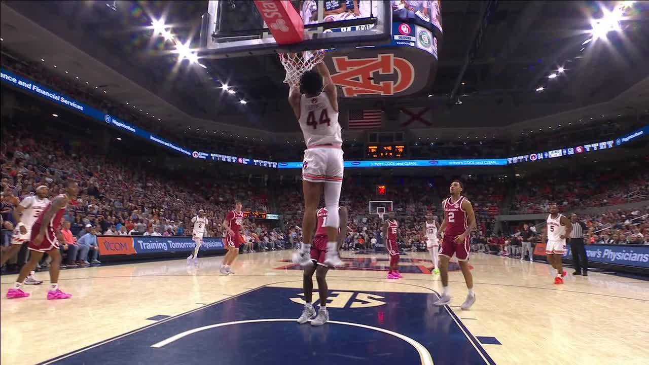 Dylan Cardwell catches a reverse alley-oop from half court