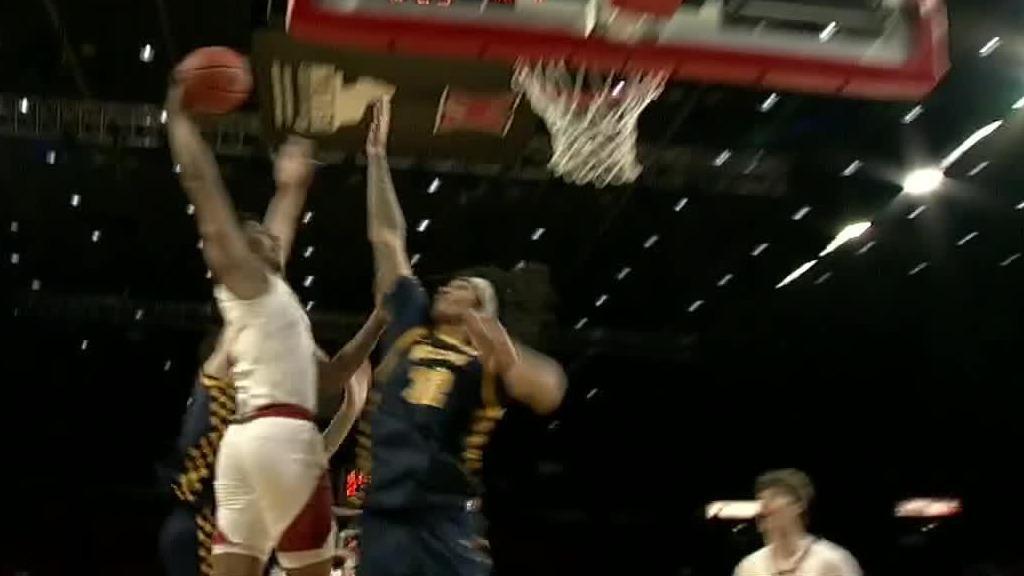 Miami (OH)'s Eian Elmer dunks over multiple defenders