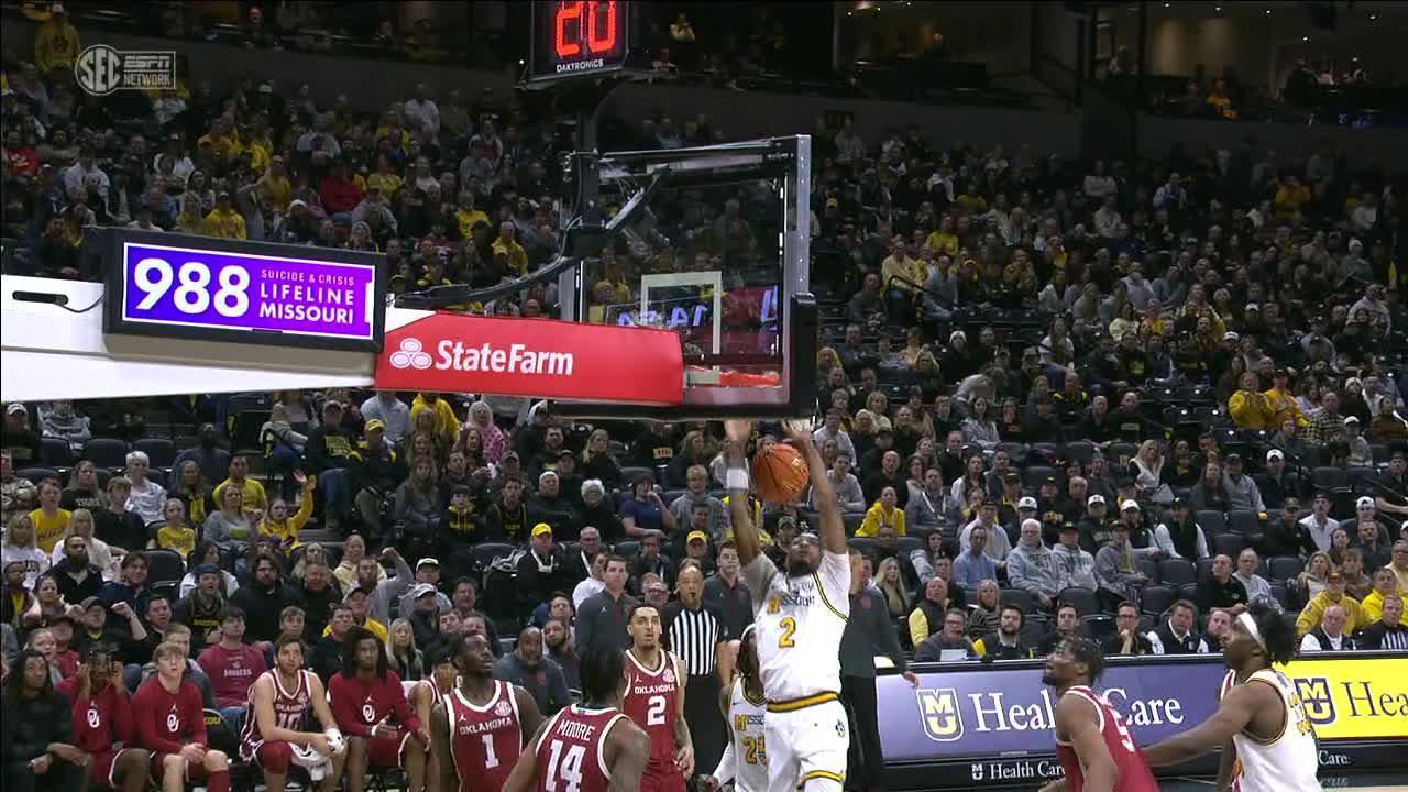 Tamar Bates fakes out his defender, drives for authoritative dunk