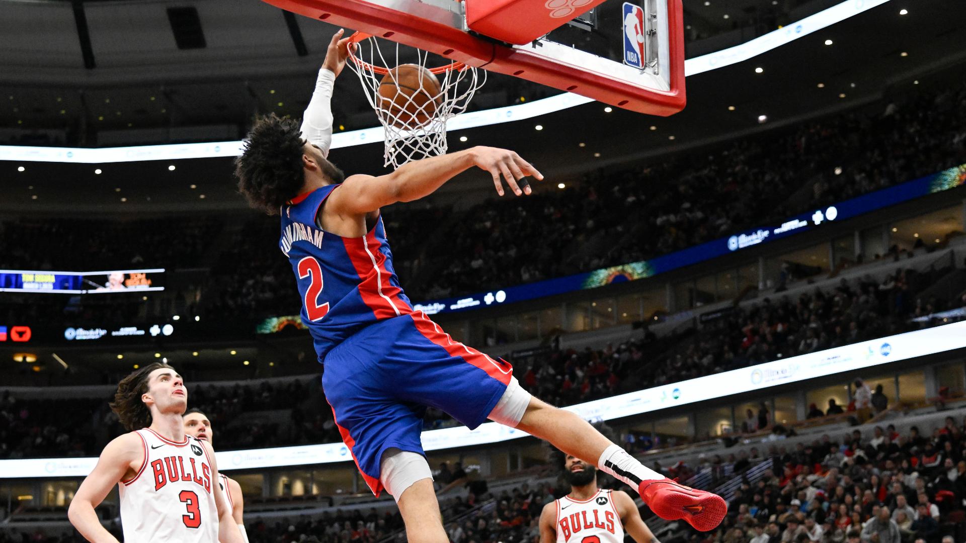 Cade Cunningham switches hands midair for filthy slam