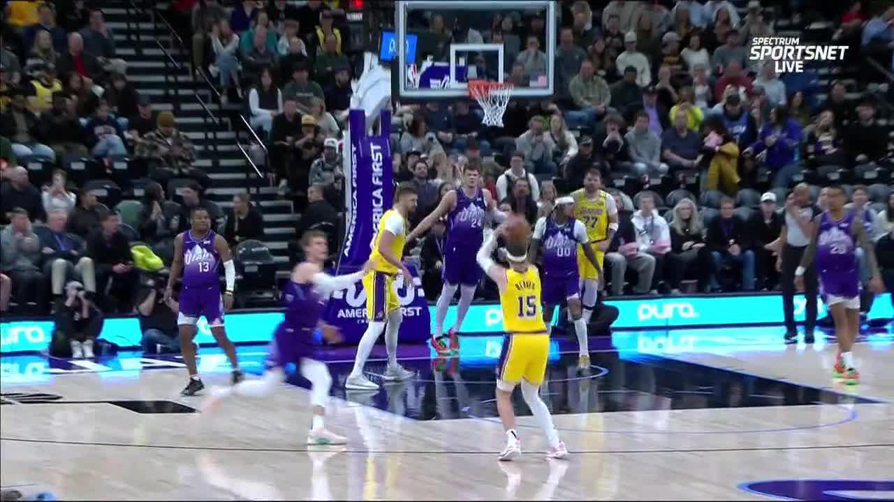 Luka Doncic's behind-the-back pass sets up Austin Reaves' triple