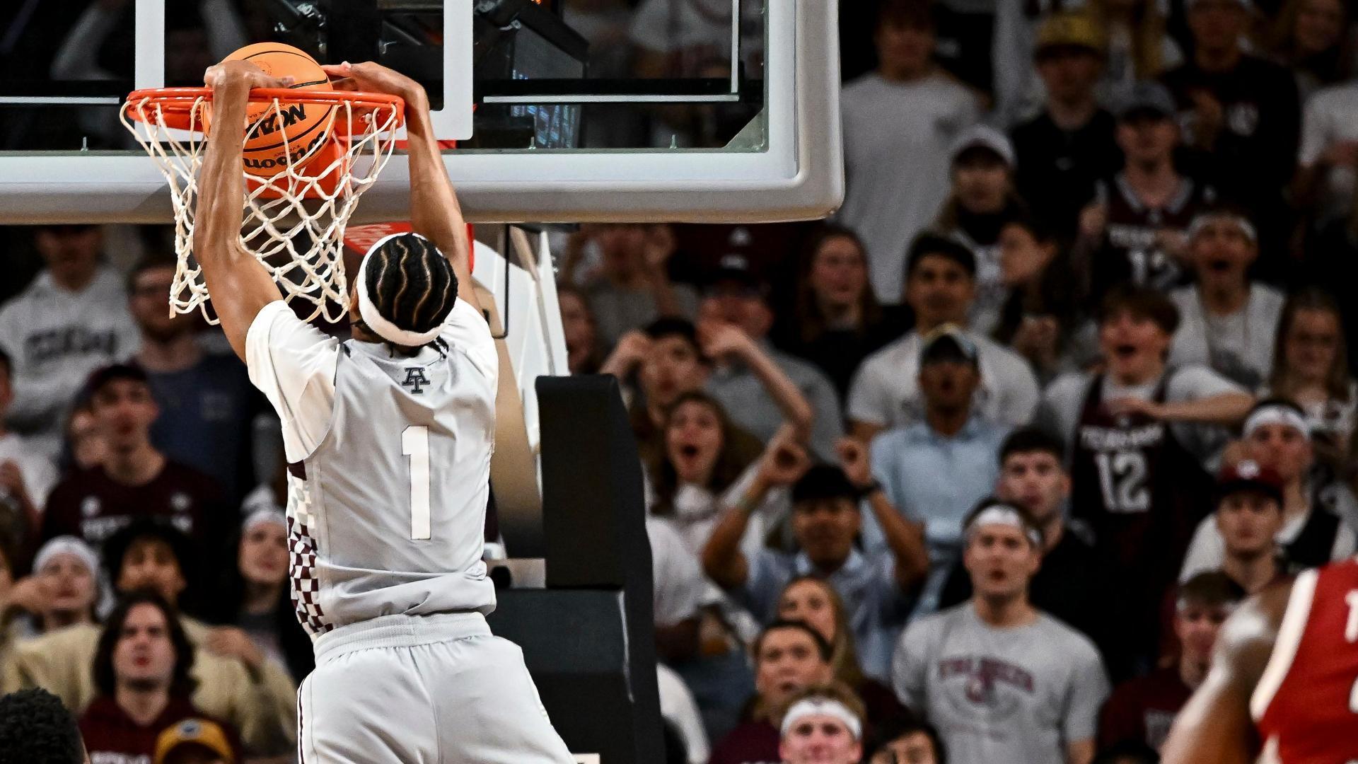 Aggies crowd fired up for this Zhuric Phelps alley-oop jam