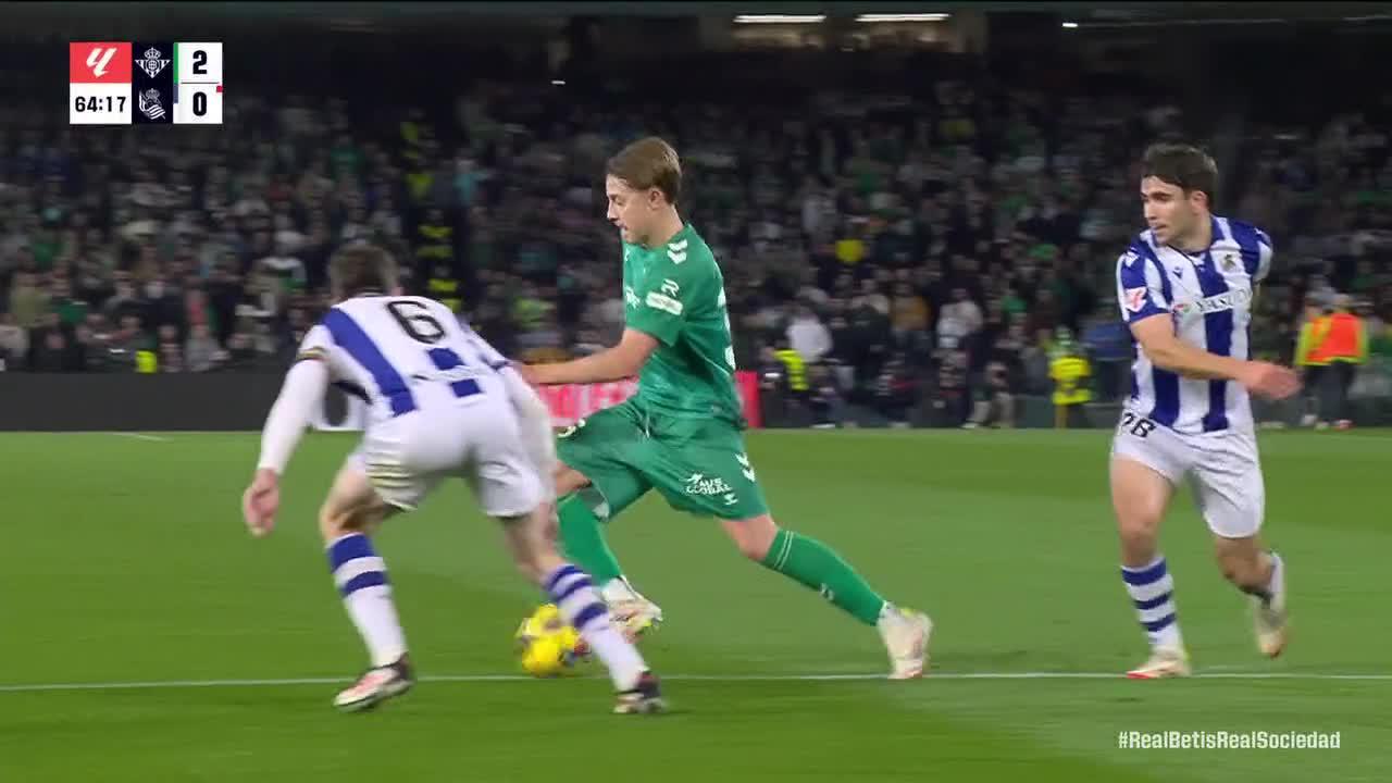 Marc Roca slots in the goal for Real Betis