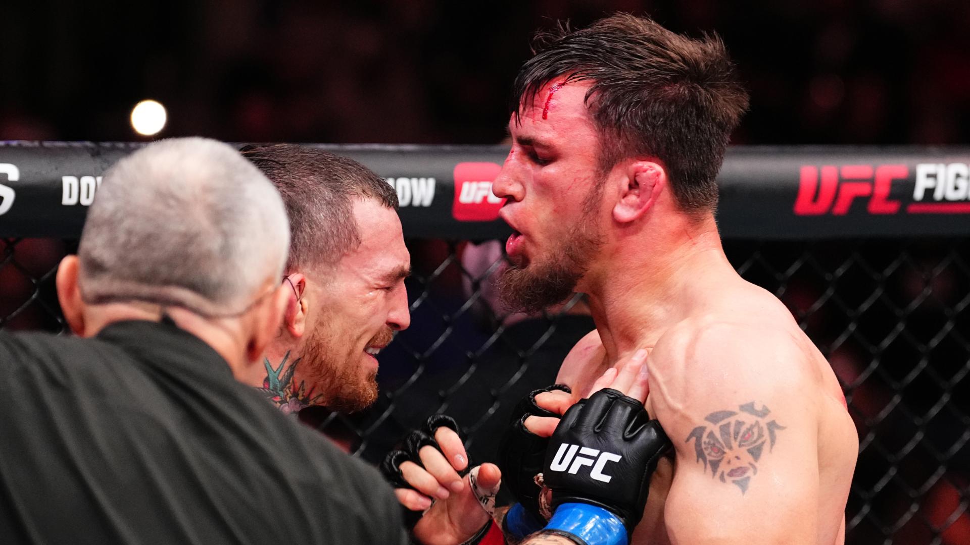Nikolay Veretennikov shoves Austin Vanderford after stoppage loss