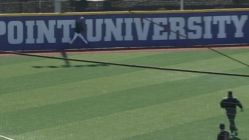 High Point's Christian Smith climbs the wall for a terrific HR robbery