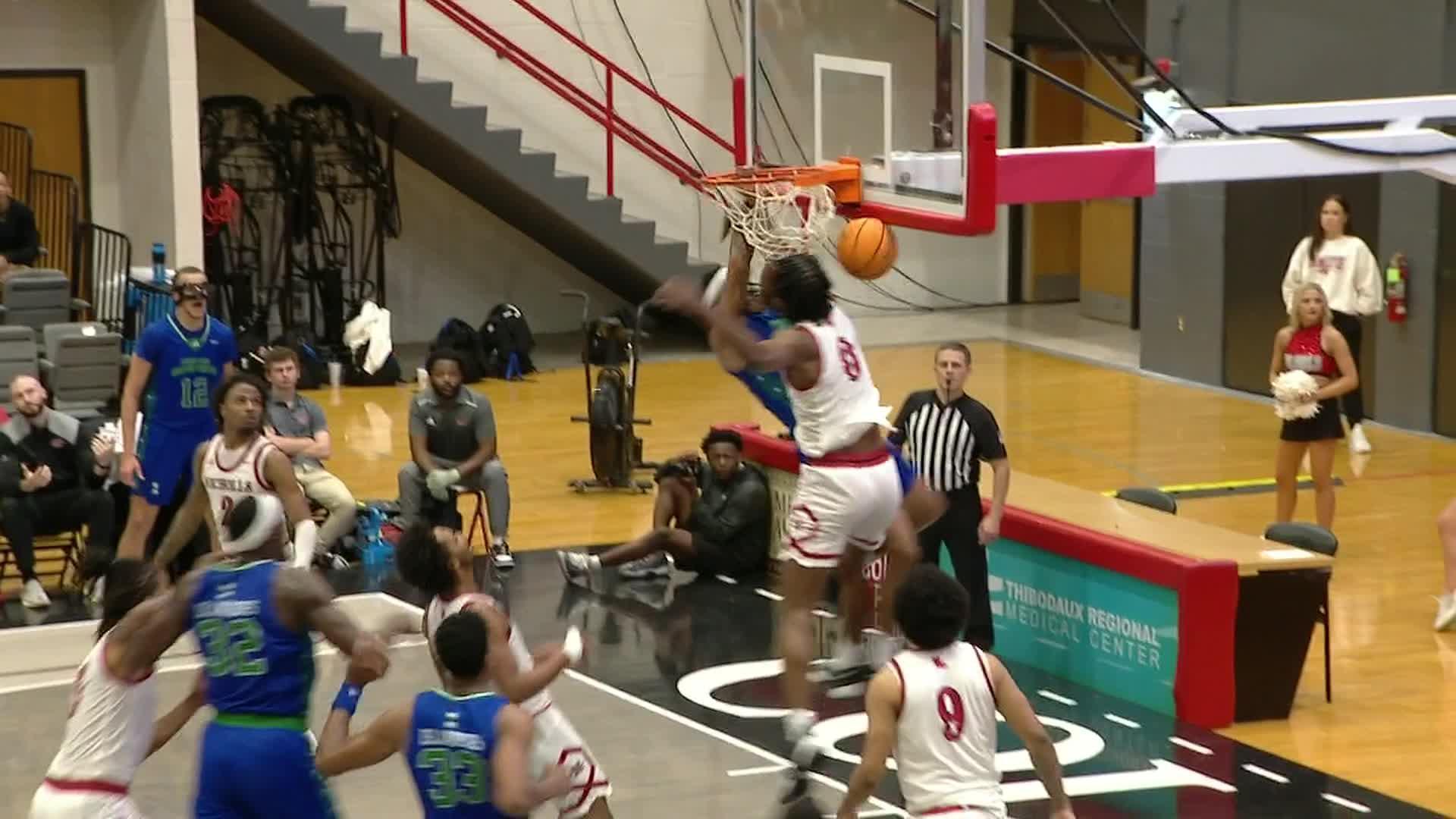 Jaden Walker gets to the rim quickly for a massive dunk