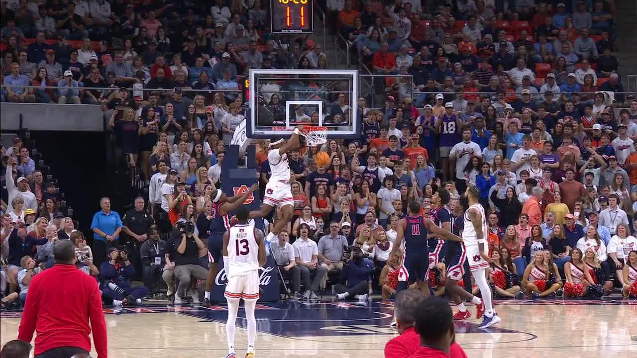 Chaney Johnson catches an alley-oop and throws it down