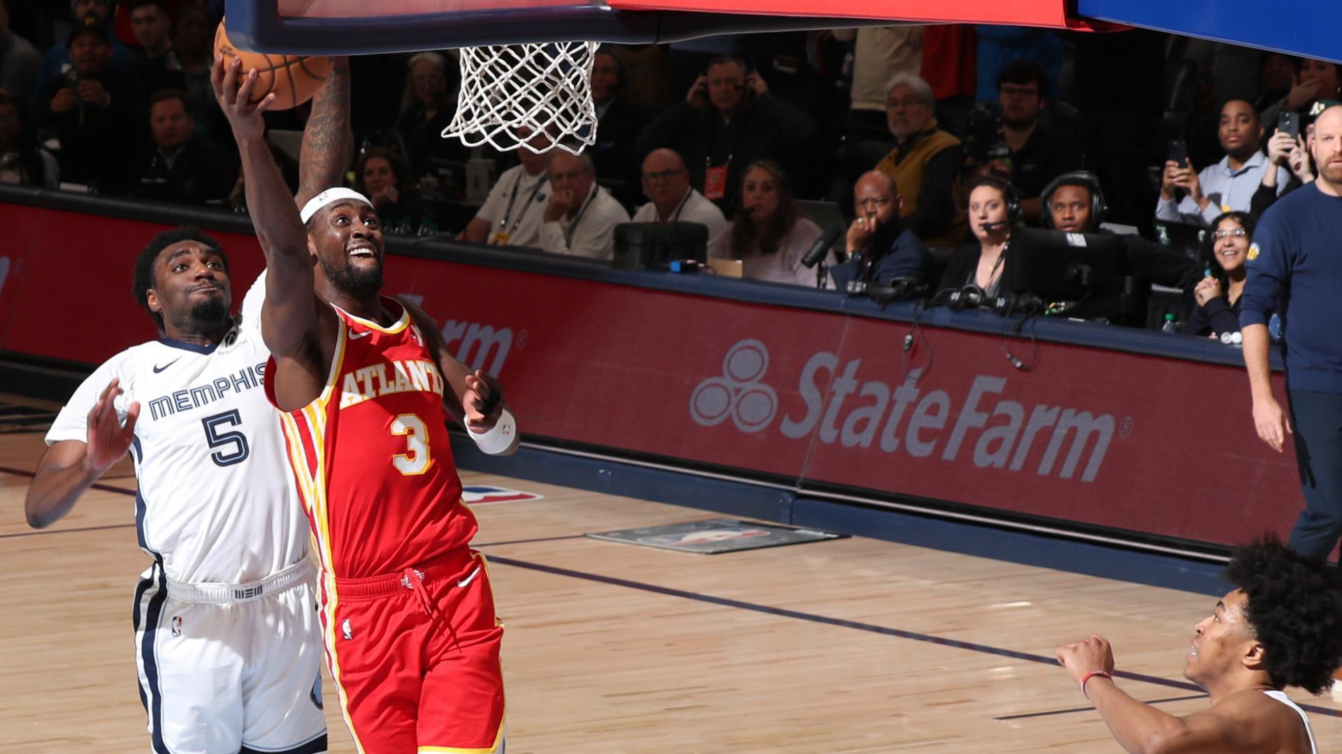 'It's all over!' Caris LeVert wins it at the buzzer for the Hawks