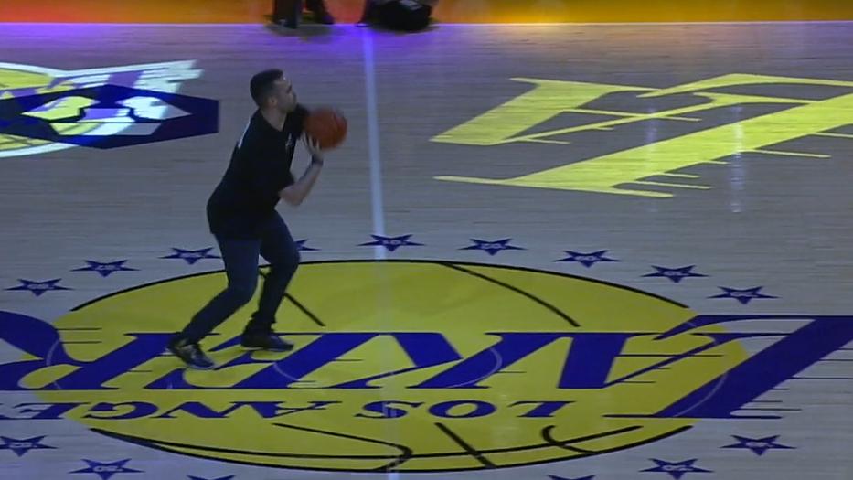 Lakers fan drains half-court shot to win $100K