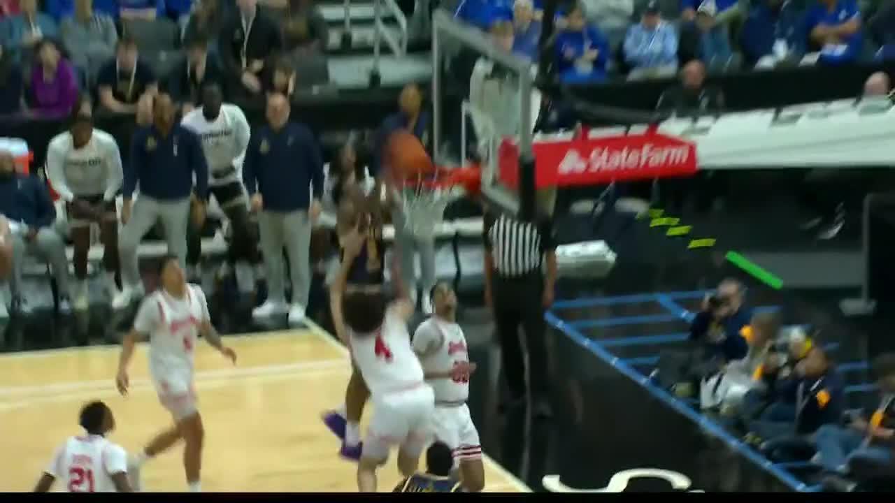 Kylen Milton gets up for a huge posterizer for Murray State