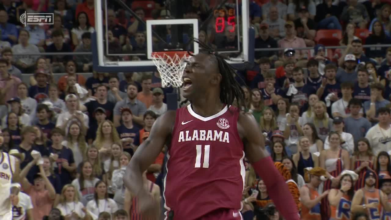 Clifford Omoruyi throws down a posterizing jam over Johni Broome