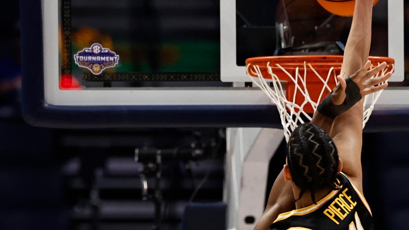 Trent Pierce soars for a huge Missouri dunk