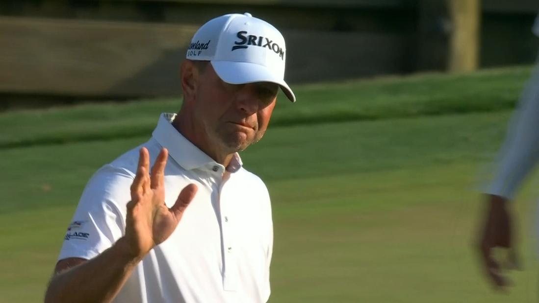 Lucas Glover chips for eagle from an extremely awkward lie