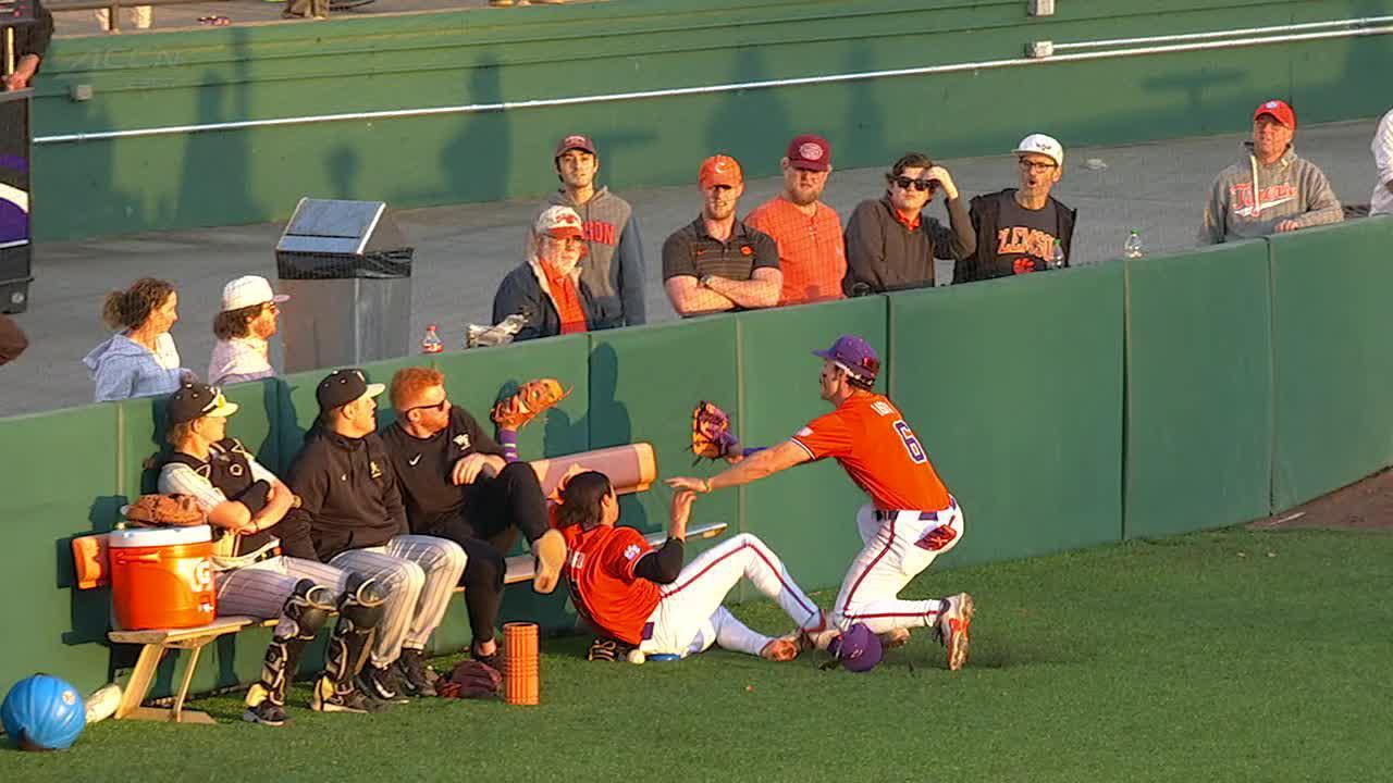 Clemson shortstop goes crashing into a bench to make a great catch