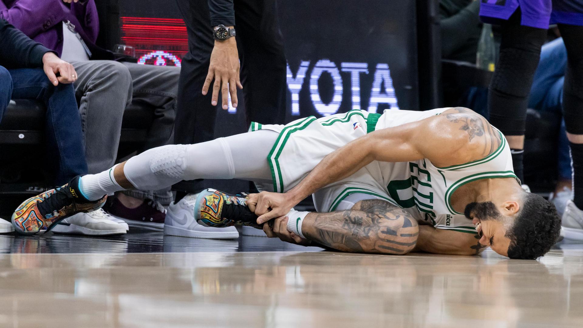 Jayson Tatum in visible pain after apparent ankle injury