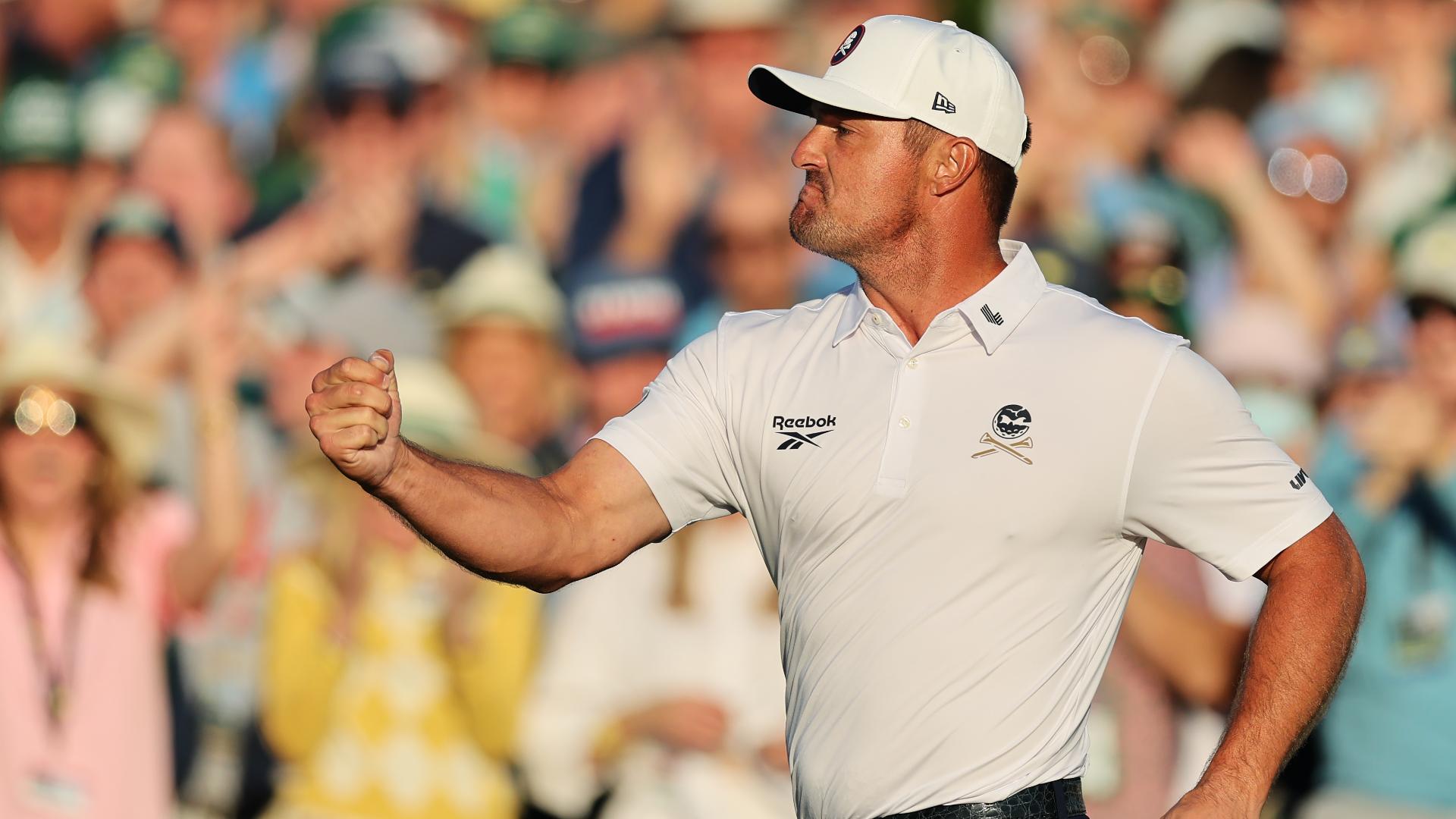 Crowd erupts as DeChambeau drains long birdie on 18